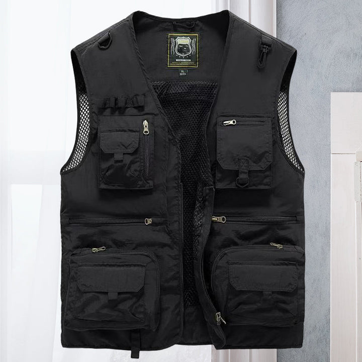 Gilet tactique homme sans manches, multi-poches, outdoor. Design léger et respirant pour activités plein air.