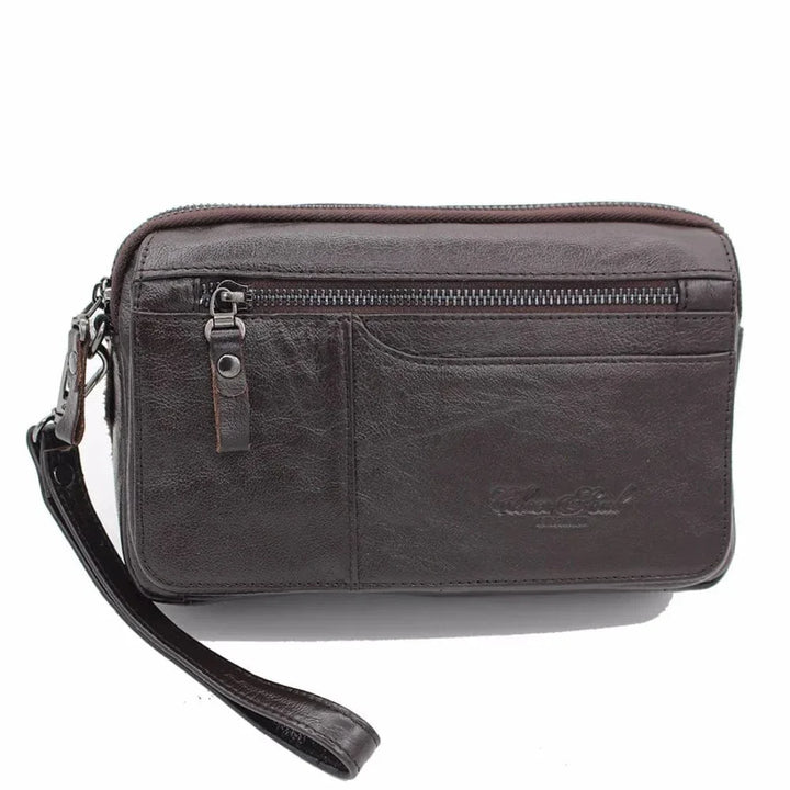 Accessoire de maroquinerie homme : grand portefeuille en cuir noir, offrant style classique et fonctionnalité