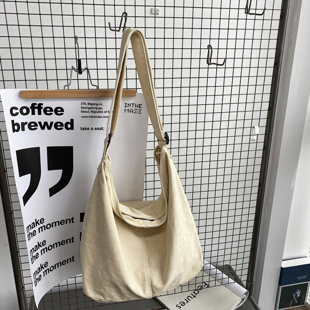 Sac à bandoulière élégant en toile pour femme, grand et spacieux. Un accessoire de mode polyvalent.