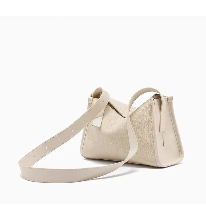 Sac d'épaule besace pour femme, en cuir, moderne et élégant, parfait pour le travail ou les sorties.