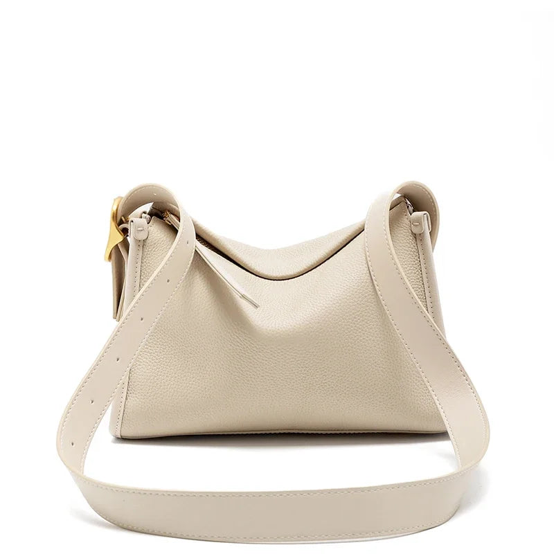 Sac à main besace en cuir, style mode femme, grand et élégant, avec bandoulière, pour un look chic.