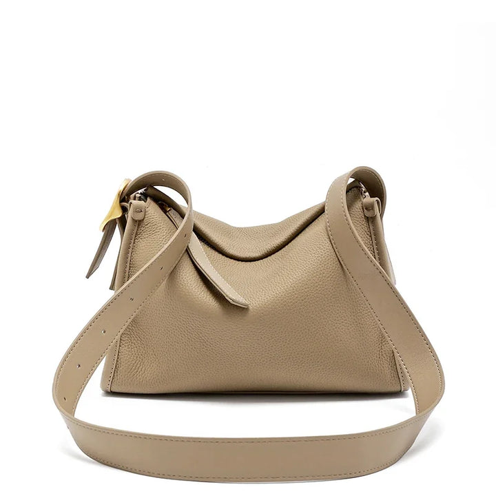 Sac à main femme moderne en cuir, style besace chic pour l'épaule, accessoire polyvalent de mode.