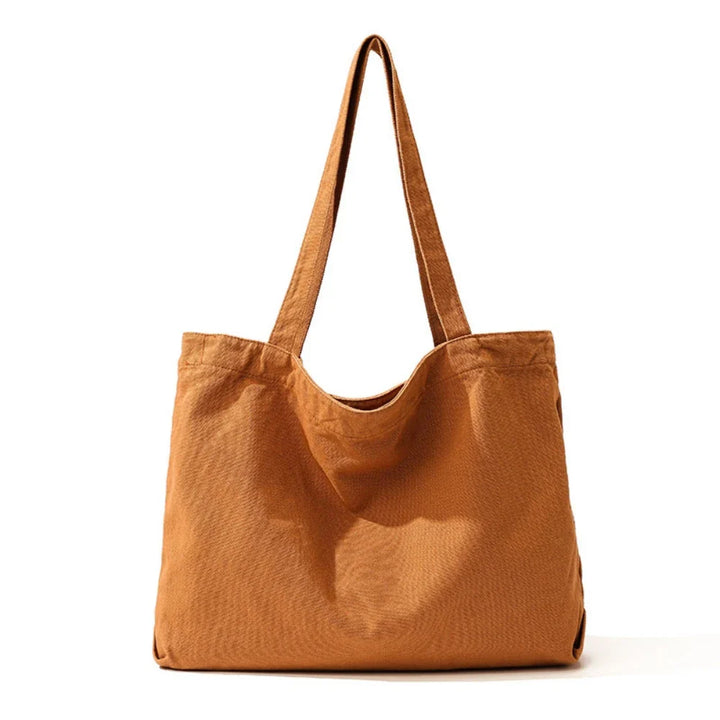 Sac cabas en coton avec anses solides, confortable à porter pour femme. Grand sac shopping ou fourre-tout quotidien.