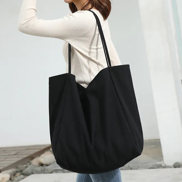 Grand sac cabas en tissu polyvalent pour femmes, idéal pour le shopping ou un usage journalier éco-responsable.