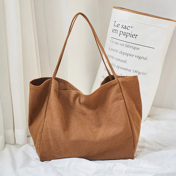 Élégant grand sac cabas en tissu pour femmes, polyvalent et éco-responsable, un indispensable pour le shopping.
