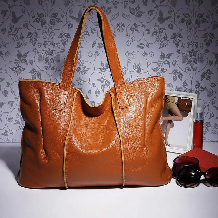 Sac cabas femme en cuir véritable marron foncé, grandeur XL, parfait pour un usage professionnel ou personnel élégant.