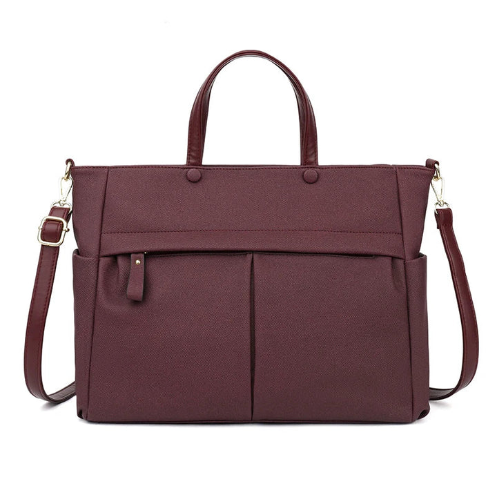 Grand sac cabas femme Élise en cuir noir, idéal pour le travail et les études, avec bandoulière.