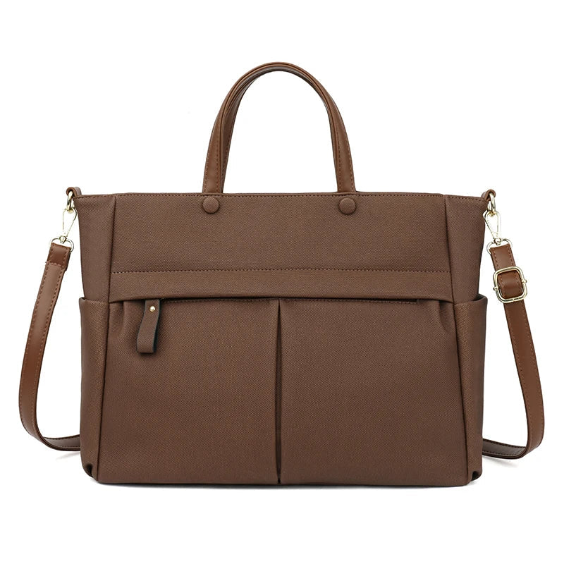 Sac cabas femme Élise imperméable, format A4, en tissu technique noir pour ordinateur portable.