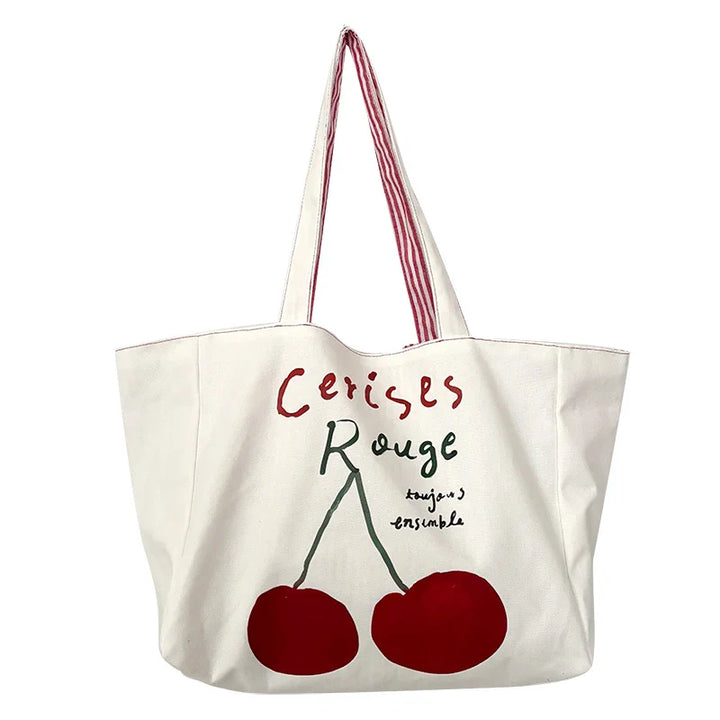 Grand sac cabas réversible pour femme, motif cerises rouge vif, parfait pour le shopping ou la plage.
