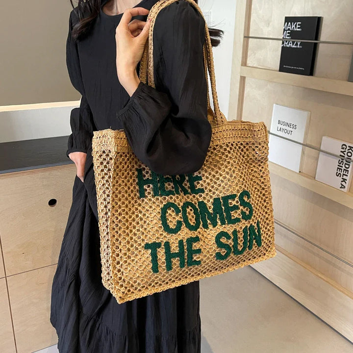 Sac cabas élégant en paille tressée crème, parfait comme accessoire de plage