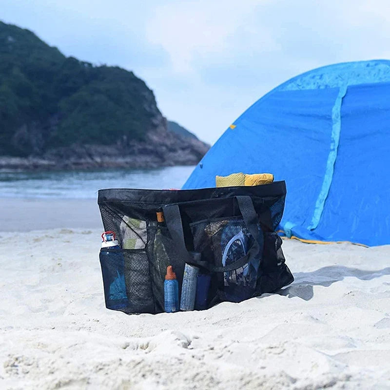Grand sac de plage familial XL noir en tissu Oxford, idéal pour vacances, plage et piscine.