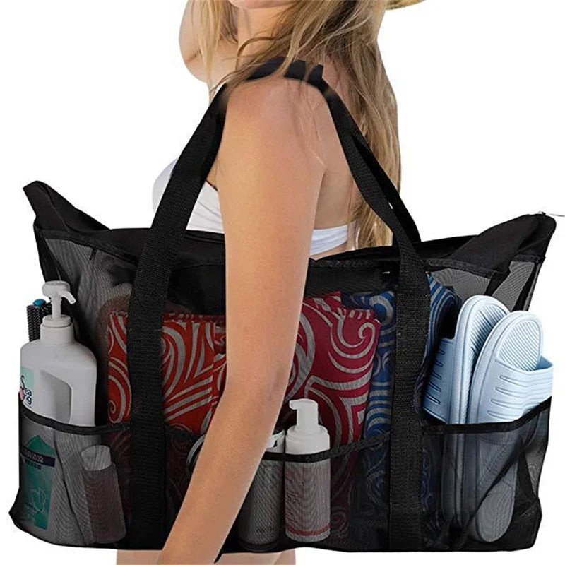 Sac de plage familial XL noir en tissu Oxford pour organiser maillots et serviettes, idéal piscine/plage.