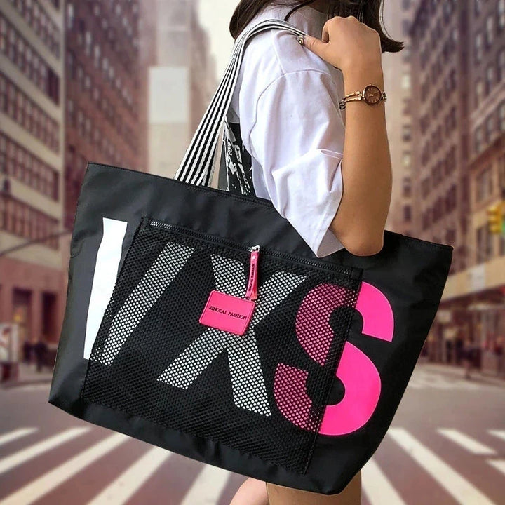 Grand sac de plage XXL en nylon imperméable, idéal pour femme et vacances d'été.