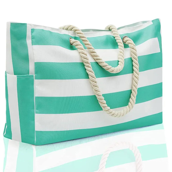 Grand sac de plage XXL étanche bleu et jaune pour femmes. Idéal pour les vacances d'été en famille.