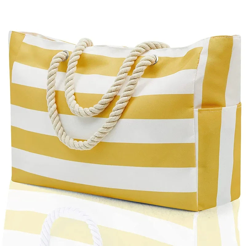 Sac de plage turquoise XXL étanche, idéal pour l'été. Accessoire de voyage grand format pour toute la famille.