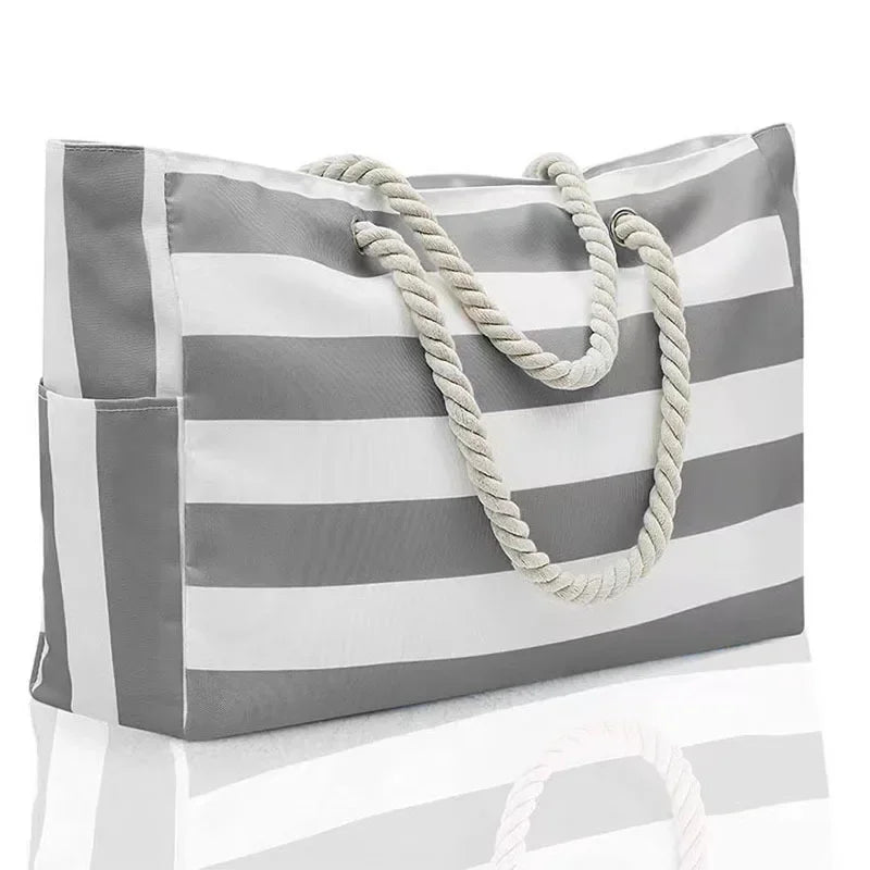 Grand sac de plage XXL étanche bleu et turquoise. Le sac fourre-tout indispensable pour vos vacances d'été.