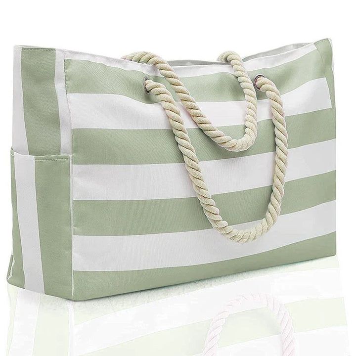 Sac de plage XXL étanche en polyester, disponible en bleu, jaune ou gris. Un accessoire de voyage robuste pour l'été.
