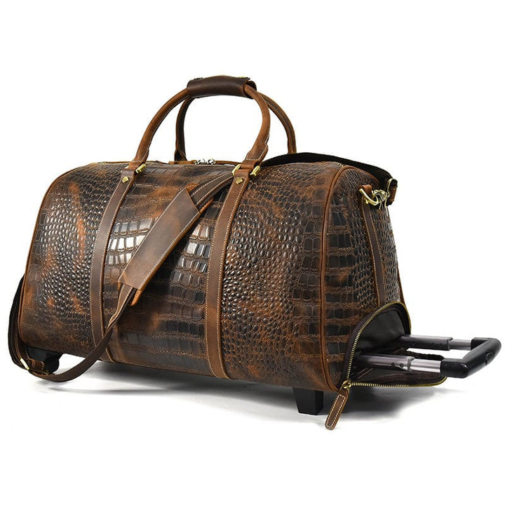 Sac de voyage homme, cuir façon crocodile. Fermetures éclair robustes. Sécurité et style.