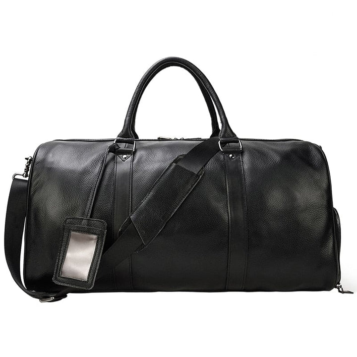 Sac de voyage en cuir pour femme, vue arrière, détails des fermoirs métalliques, bagage à main fonctionnel.