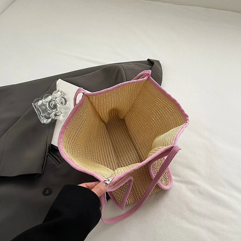 Accessoire de mode été : sac de plage fourre-tout Hélios en paille pour femme stylée