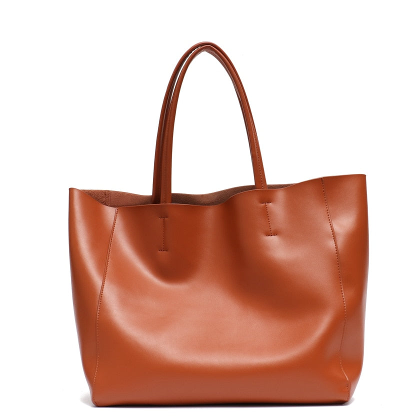 Grand sac à main cabas en cuir véritable pour femme, élégant et pratique, vue frontale.