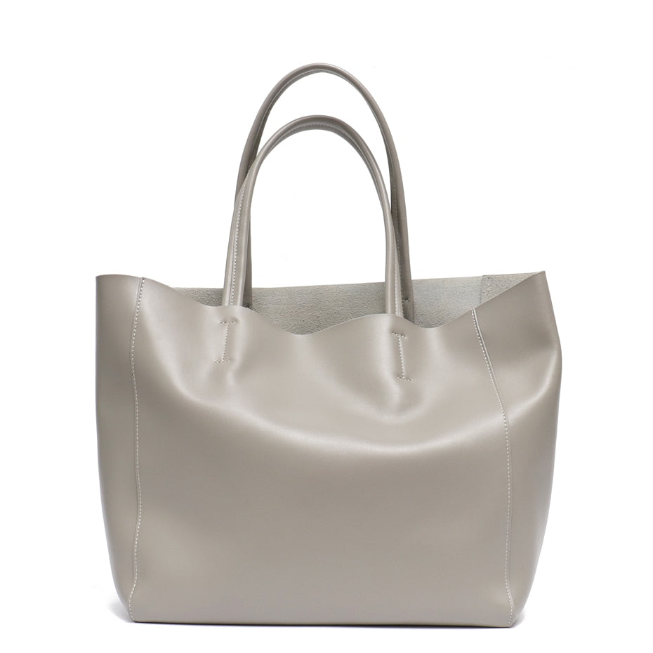 Sac à main en cuir véritable de haute qualité, pour la femme moderne et sophistiquée.