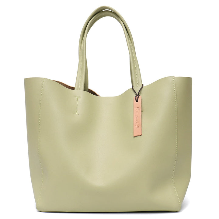 Sac à main grand format en cuir véritable, avec fermetures sécurisées, pour femme élégante.