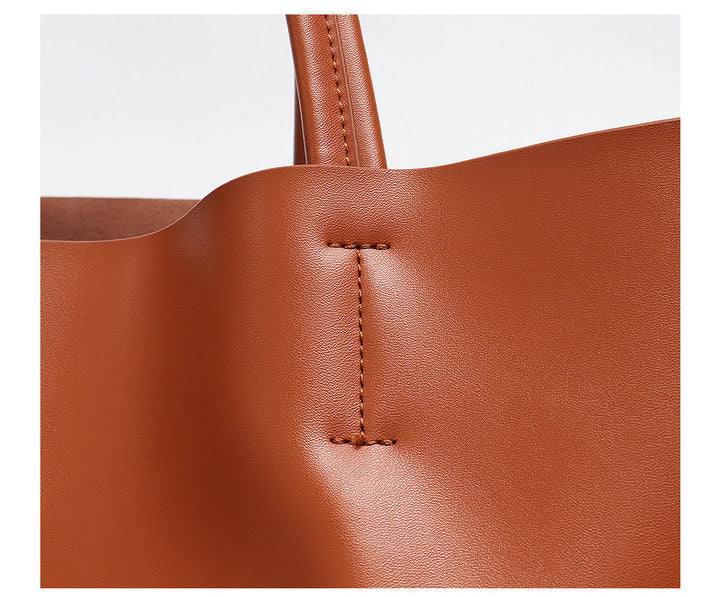 Sac à main femme en cuir véritable marron, grand format, accessoire mode quotidien.