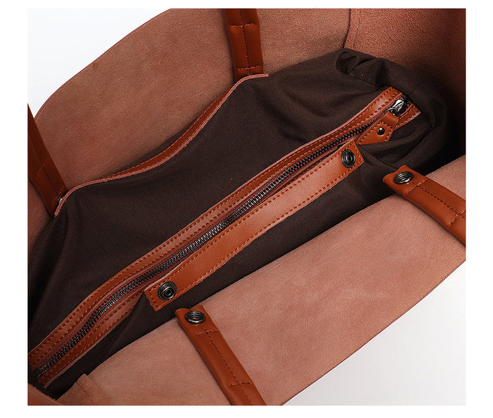 Élégant sac cabas en cuir noir pour femme, intemporel, idéal pour le travail ou shopping.