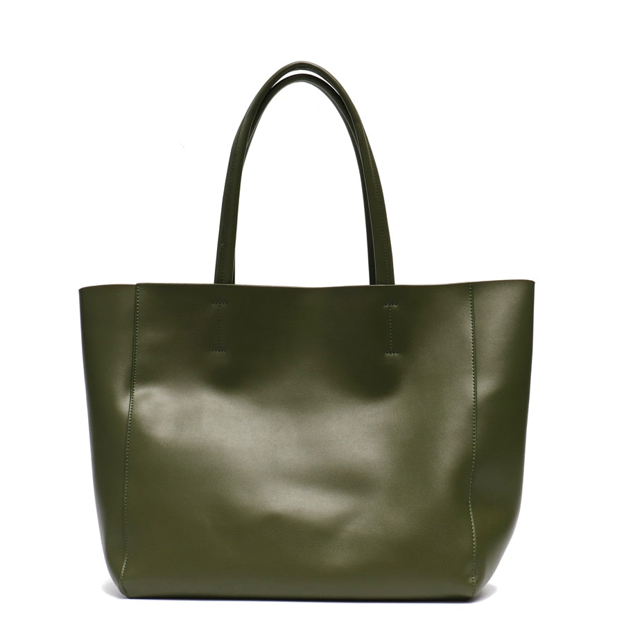 Sac à main femme élégant en cuir véritable, avec anses robustes et finitions de qualité.
