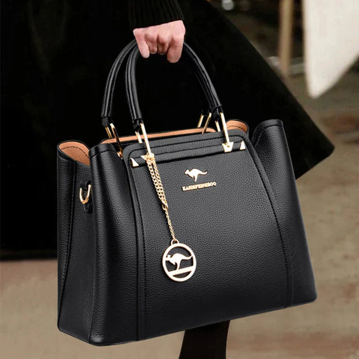 Grand sac à main femme en cuir marron, style élégant et luxueux, parfait pour le quotidien.