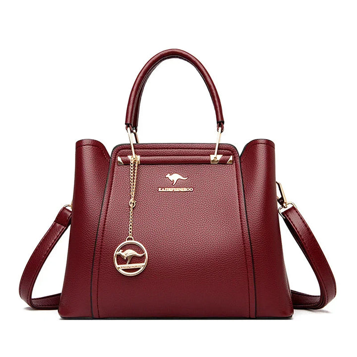Sac bandoulière en cuir pour femme, grand et polyvalent, parfait pour un usage quotidien avec style.