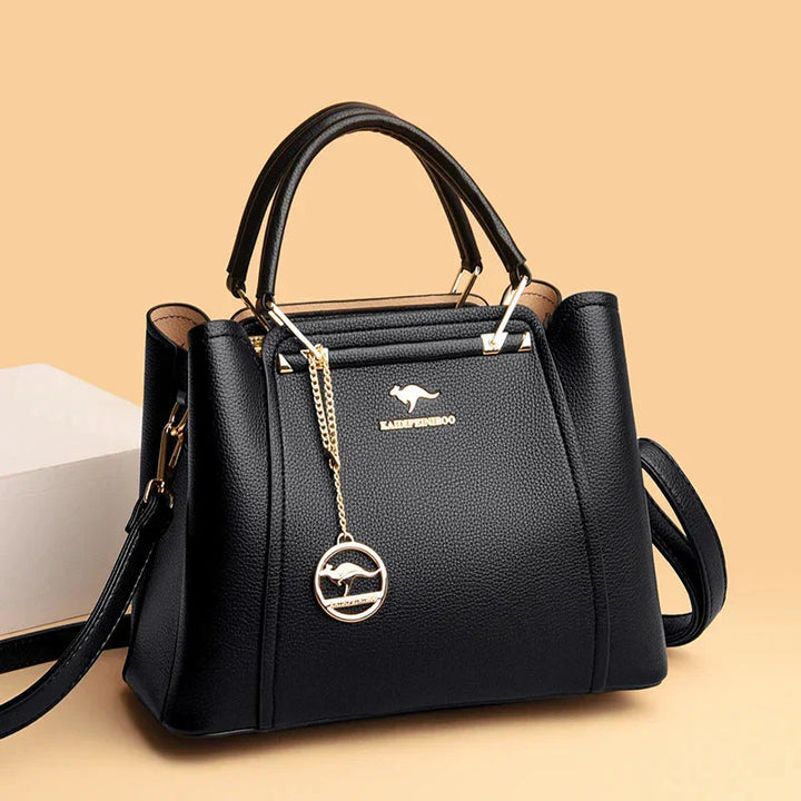 Sac à main femme en cuir grainé, grand format, couleur intemporelle, accessoire mode polyvalent.
