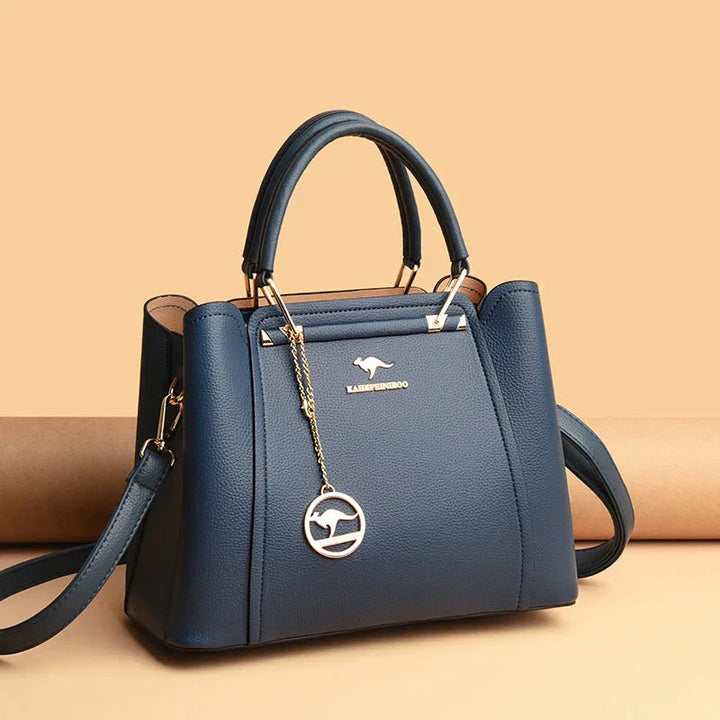 Sac à main femme en cuir porté en bandoulière, grand et polyvalent, idéal pour le quotidien actif.