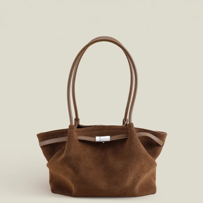 Sac à main femme spacieux en cuir suède, élégant et pratique pour le quotidien, accessoire mode porté épaule.