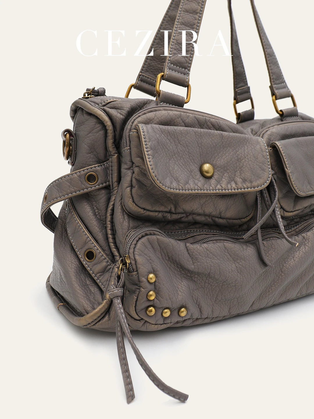 Sac à main femme gris tendance en cuir synthétique, texture élégante. Grand sac organisateur pour cours et travail.