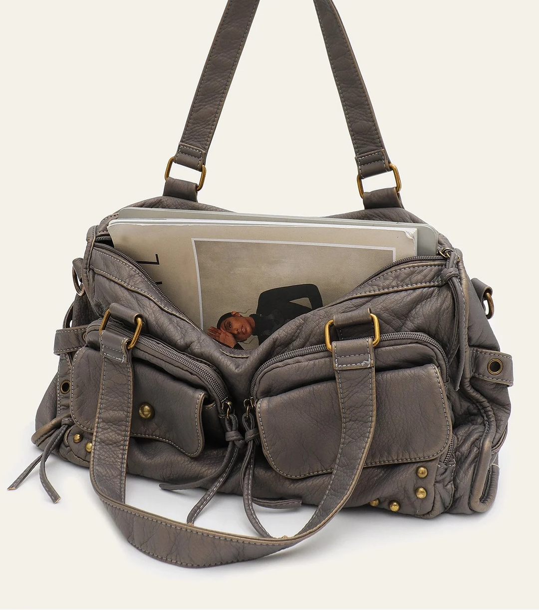 Sac à main femme chic et tendance en cuir synthétique gris. Grand sac élégant XL pour la mode femme et les cours.