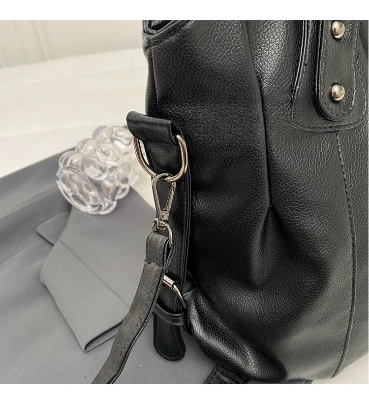 Sac bandoulière cuir femme, style décontracté chic, offrant une grande capacité.