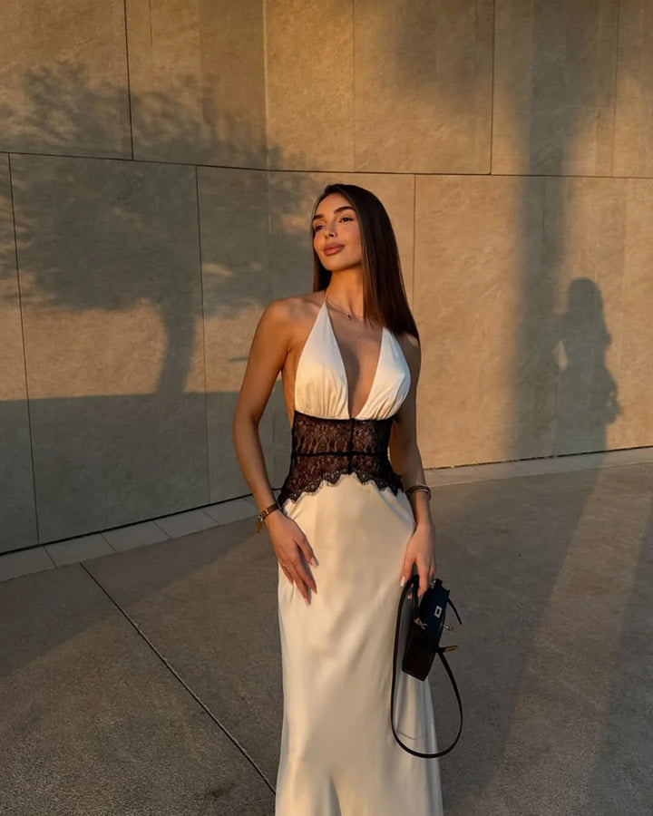 Robe longue satinée fluide pour femme, style halter avec fente latérale, élégante pour la mode estivale.