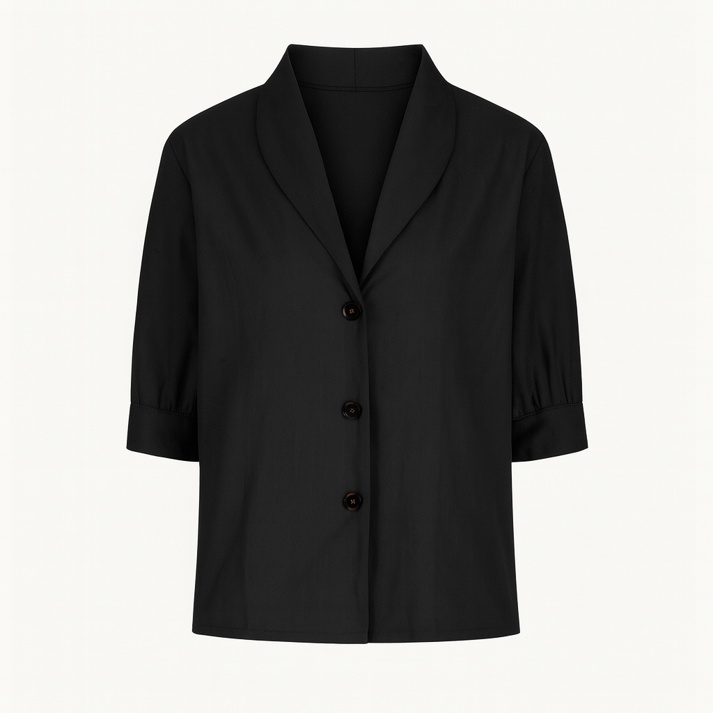 Top femme fluide noir à manches courtes, parfait pour un style mode décontracté et élégant.