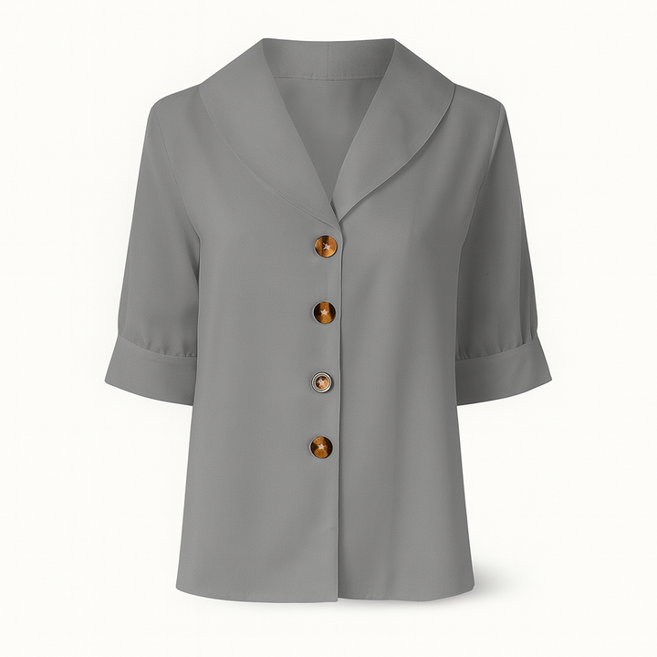 Blouse femme chic en tissu doux et respirant, offrant confort et une allure moderne.