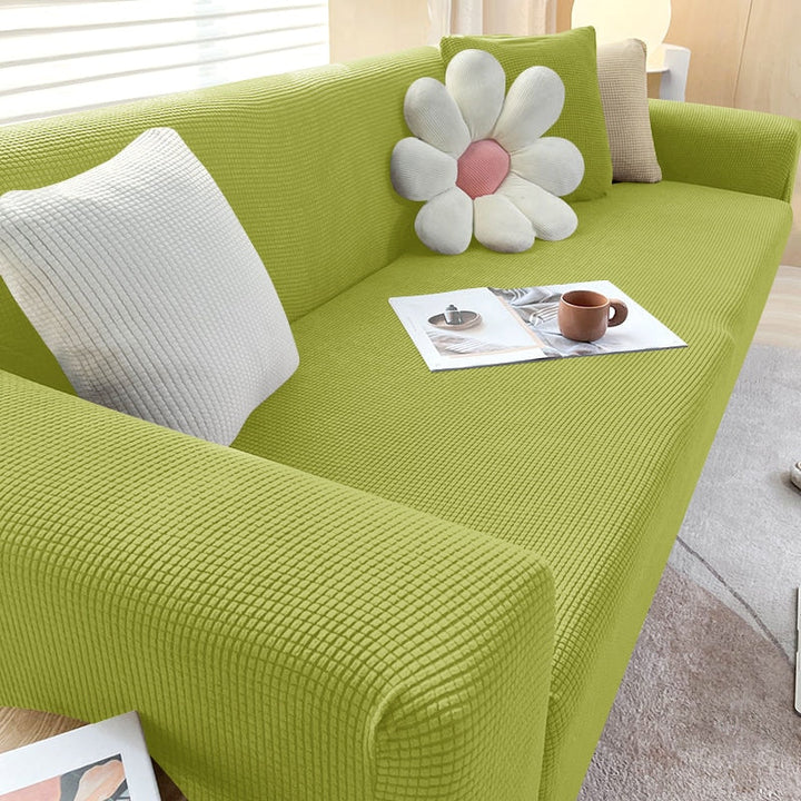 Housse de canapé extensible beige avec motif élégant et design antidérapant, disponible en plusieurs tailles pour salons mode