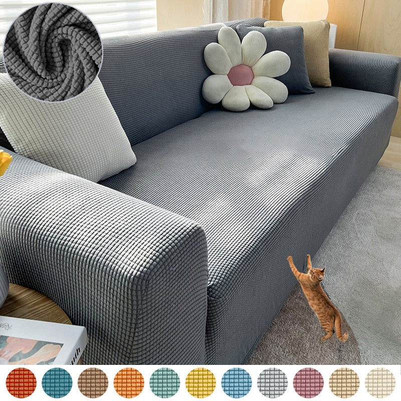 Housse de canapé extensible beige avec motif élégant et design antidérapant, disponible en plusieurs tailles pour salons mode