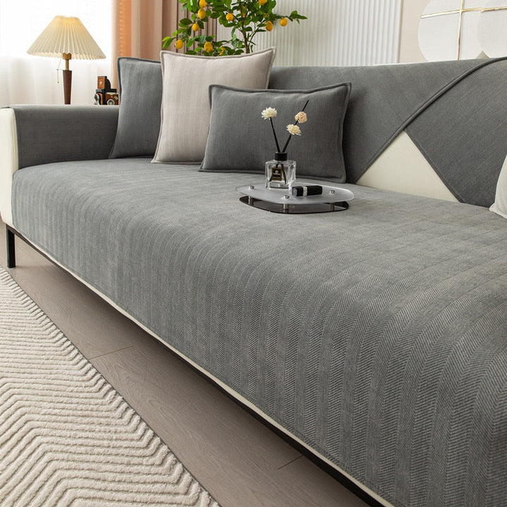 Housse de canapé extensible, protection anti-taches.  Tissu élégant et résistant, facile d'entretien.