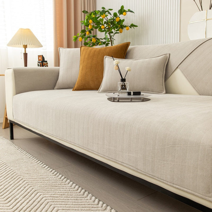 Housse de canapé extensible, protection anti-taches.  Tissu élégant et résistant, facile d'entretien.