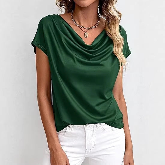 Top féminin simple à col rond et manches courtes, offrant style et confort pour le printemps et l'été décontracté.