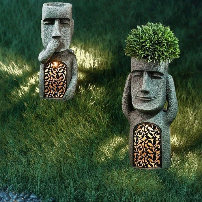 Jardinière solaire LED sculpturale décorative. Éclairage extérieur élégant.