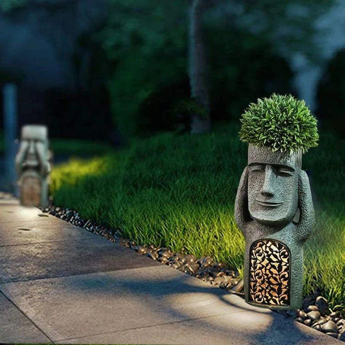 Jardinière solaire LED sculpturale décorative. Éclairage extérieur élégant.