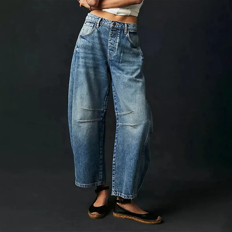 Jean large femme élégant, confort coton doux, coupe flatteuse, coloris bleu, style moderne polyvalent pour toutes occasions.