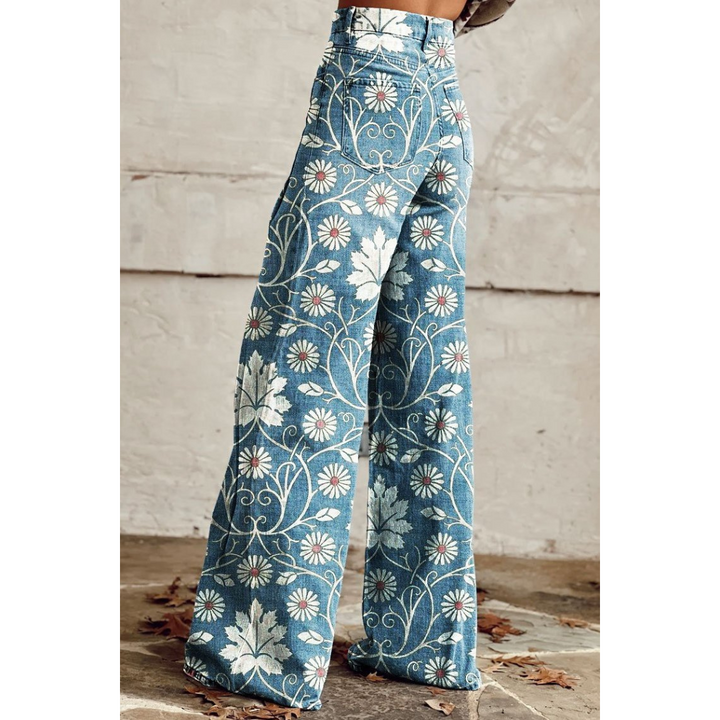Pantalon jeans femme avec motifs floraux, coupe décontractée et tendance, parfait pour la mode quotidienne.